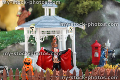 Stock image of model Halloween spooky town / village, miniatures, Dracula vampire, pumpkin heads, gazebo