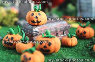 Stock image of homemade model Halloween display, polymer modelling clay pumpkins, coffin, graveyard cemetery