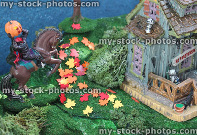 Stock image of model Halloween town / village, miniatures, haunted house, headless horseman, pumpkins