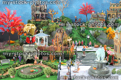 Stock image of model Halloween town / village, miniature houses, skeletons, pumpkins, skulls, autumn trees