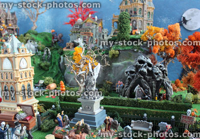 Stock image of model Halloween spooky town, miniatures, graveyard, cemetery, gravestones, zombies, dracula, skull mountain