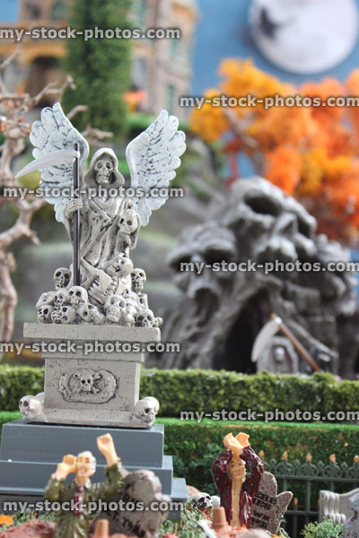Stock image of model Halloween spooky town / village, Angel of Death statue, grim reaper, zombies