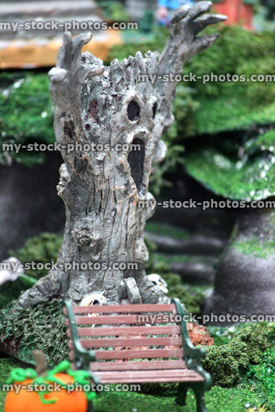 Stock image of model Halloween Spooky town / village, haunted scary tree monster, face