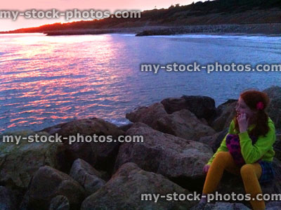Stock image of sunset on English coastline, next to Highcliffe beach, Dorset