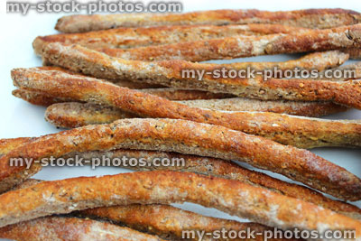 Stock image of homemade breadsticks, long and thin crispy bread sticks