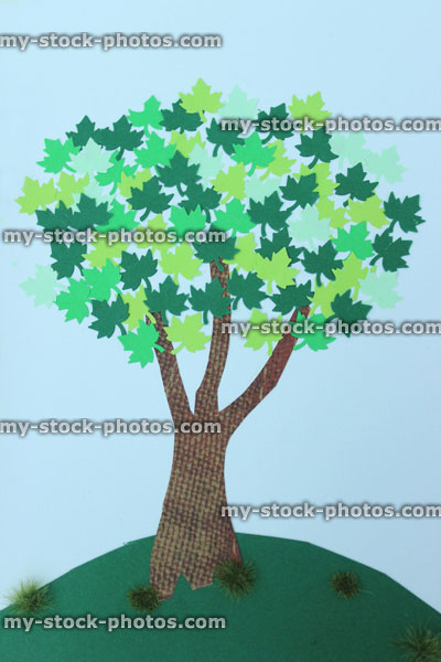Stock image of homemade Happy Birthday greetings card with paper tree leaves