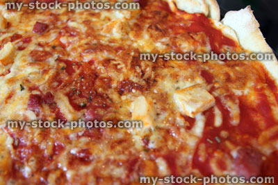 Stock image of homemade cheese and tomato pizza crust, margarita pizza