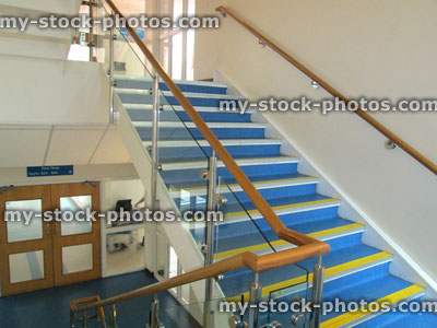 Stock image of modern blue and yellow stairs / staircase in hospital