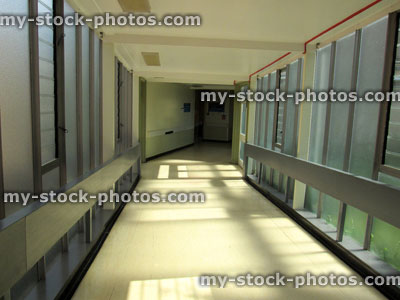 Stock image of NHS Hospital Corridor, leading to medical treatment rooms