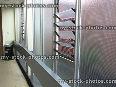 Stock image of reinforced glass windows at hospital, ventilation in corridor