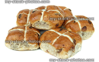Stock image of homemade Easter hot cross buns, isolated white background