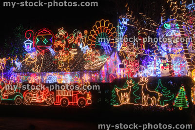 Stock image of Christmas house, colourful Christmas lights / decorations, dark night