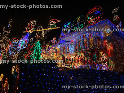 Stock image of house, colourful Christmas lights at night, night time illuminations