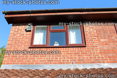 Stock image of red brick house extension, extended building, mortar colour
