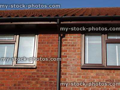 Stock image of red brick house extension with different colour mortar / bricks