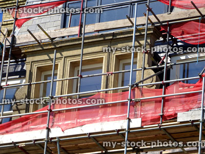 Stock image of builder's scaffolding platform tower for house / window repairs