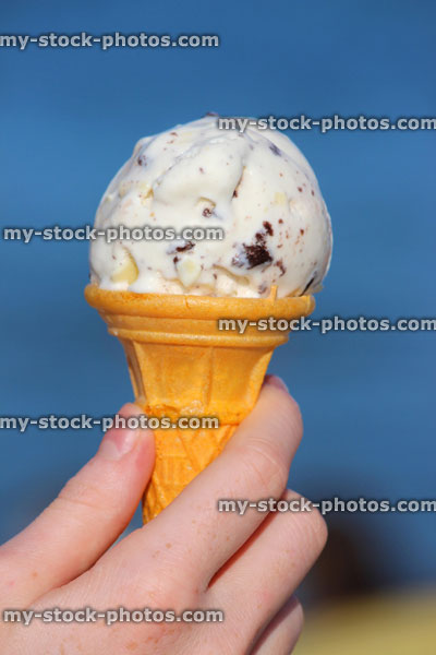 Stock image of cookies and vanilla ice cream cone, clotted cream