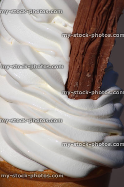 Stock image of soft serve '99' whippy ice cream cone with chocolate flake