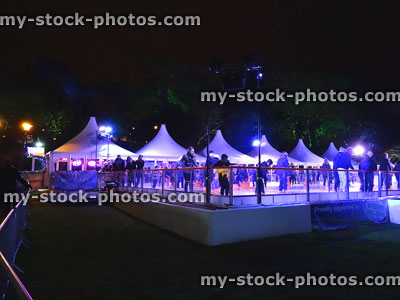 Stock image of open-air ice skating rink at Christmas time, lights