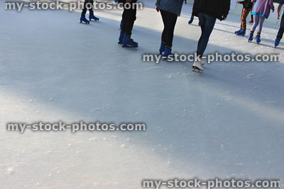Stock image of Christmas ice skating rink in town-centre with skaters