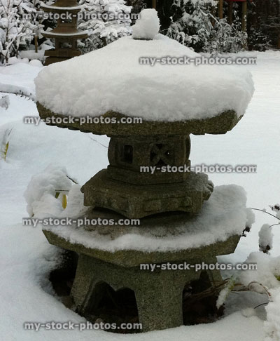 Stock image of stone Japanese lantern in the snow