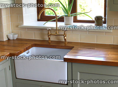 Stock image of farmhouse kitchen, Belfast / Butler sink, real wood countertop