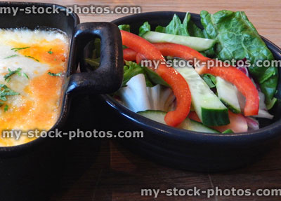 Stock image of lasagne pasta dish, bechamel sauce, melted cheese, salad