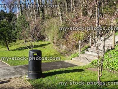 Stock image of outside litter bin in park garden, rubbish / waste collection