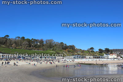 Stock image of Lyme Regis seaside town, families playing on beach