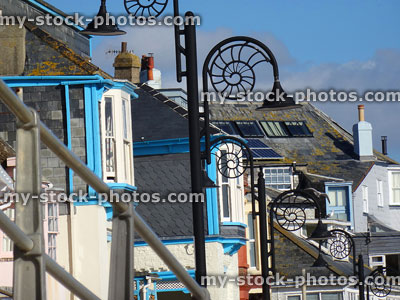 Stock image of shops, houses, hotels and street lamps, Lyme Regis town centre