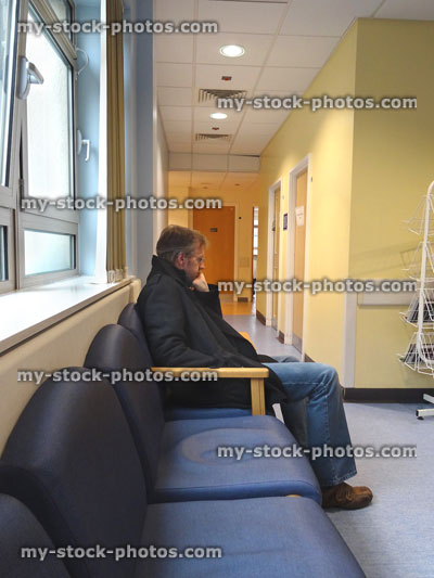Stock image of man waiting for doctor's appointment in NHS hospital