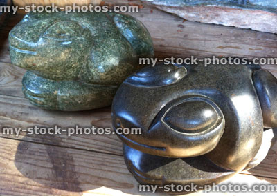 Stock image of african Zimbabwe art frog sculptures carved from soapstone
