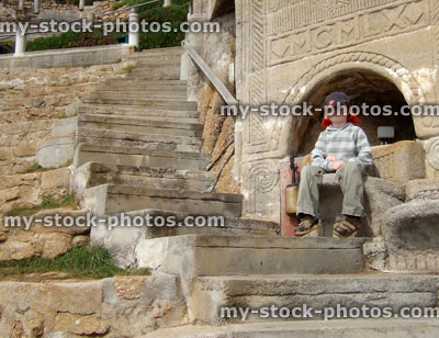 Stock image of little boy in Minack Theatre seating