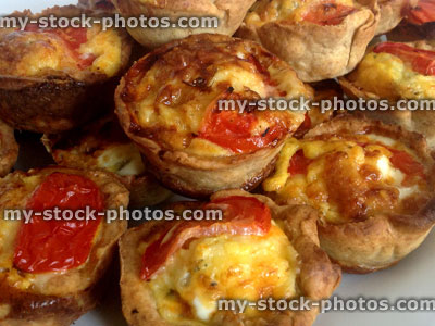 Stock image of homemade mini savoury quiches (egg flans)