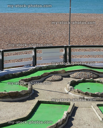 Stock image of seaside miniature golf course, minigolf by beach / sea