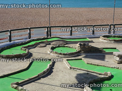 Stock image of seaside miniature golf course next to beach / sea