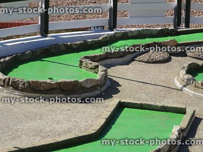 Stock image of putting greens at seaside miniature golf course / crazy golf