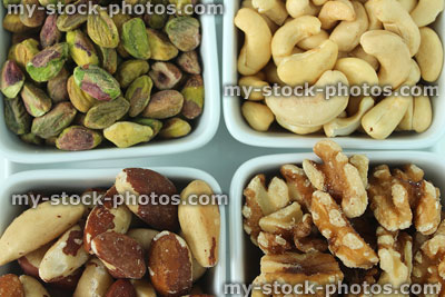 Stock image of mixed nuts, cashews, walnuts, pistachios, brazil nuts, healthy eating protein
