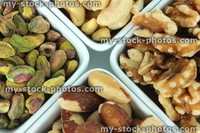 Stock image of mixed nuts (healthy snack), cashews, walnuts, pistachios, brazils, healthy fats