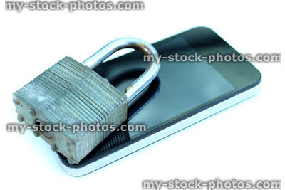 Stock image of mobile phone / smartphone, padlock reflection on glass screen