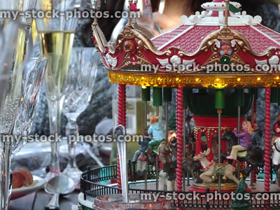 Stock image of miniature toy carousel roundabout at Christmas with model horses
