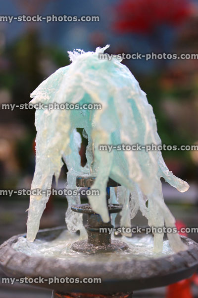 Stock image of homemade model fountain, icy frozen water / miniature village