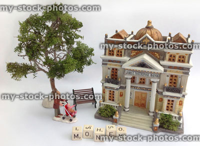 Stock image of model bank with money, mother and