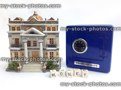 Stock image of money box (blue safe) and model bank