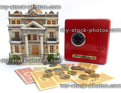 Stock image of money box (red safe), bank and cash