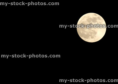 Stock image of full moon taken in April, black night sky