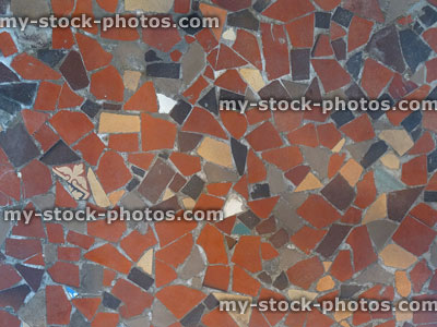 Stock image of mosaic floor pattern made with broken tiles, grouted