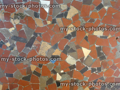 Stock image of mosaic floor pattern of broken terracotta tiles / collage