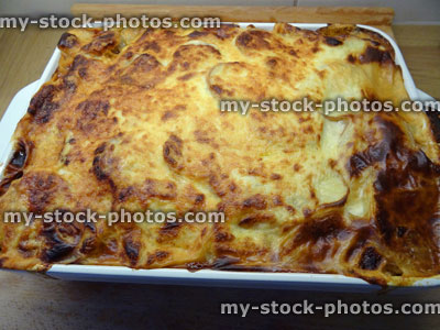 Stock image of freshly cooked moussaka meal in white oven dish