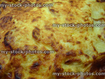 Stock image of freshly cooked moussaka meal, cheese sauce topping